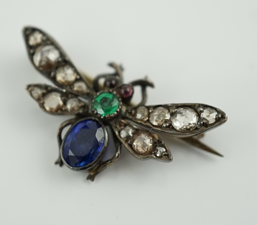 A Victorian gold and silver, emerald, diamond and sapphire cluster set bug brooch